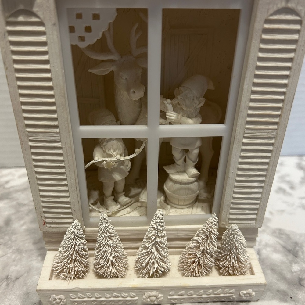 Dept 56 Holiday silhouettes Ready to fly and Bringing Santa’s Toy box in Cream